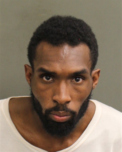 Mugshot of RUFUS DESAVION III HARVIN