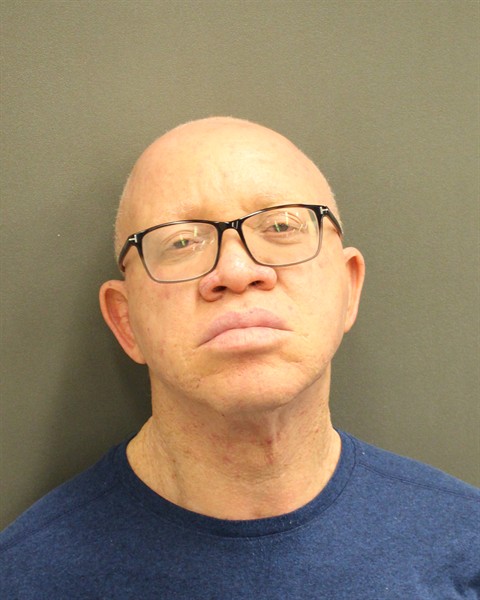 Mugshot of MICHAEL AKPEKE