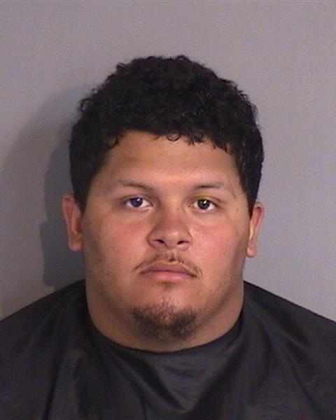 Mugshot of JUSTIN JAVIER SANTOS