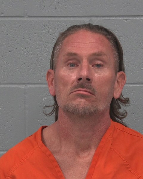 Mugshot of TRAVIS DEWITT HEID