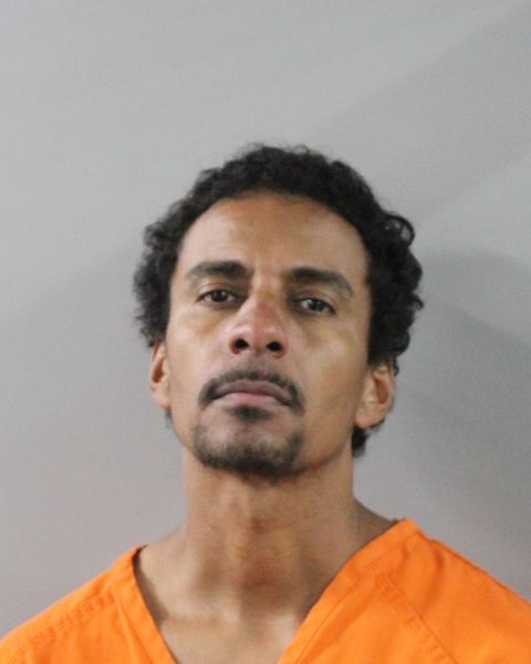 Mugshot of REYNALDO SANTIAGO