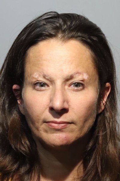 Mugshot of MARIE NICOLE DELUCIAN