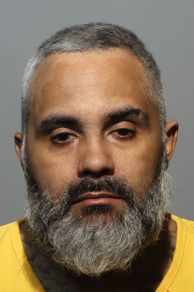 Mugshot of JUSTIN CARMO
