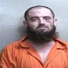 Mugshot of TRAVIS EUGENE GUMP-SCHROM