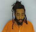 Mugshot of DOMNIQUE QWAUI THOMAS