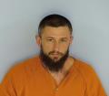 Mugshot of JOHN RICHARD-AARON STRANGE