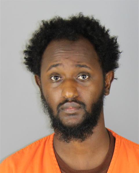 Mugshot of MUHYADIN ABDIWALI HUSSEIN