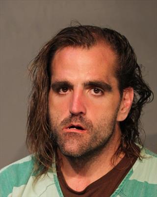 Mugshot of JUSTIN MICHAEL CUEVAS