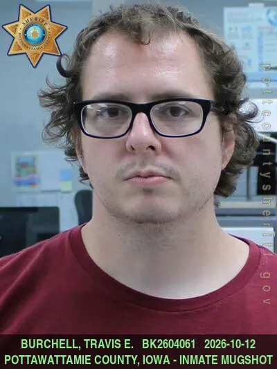 Mugshot of TRAVIS ELLIOTT BURCHELL