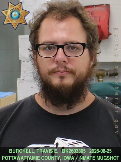 Mugshot of TRAVIS ELLIOTT BURCHELL