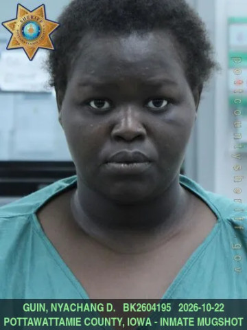 Mugshot of NYACHANG DIW GUIN