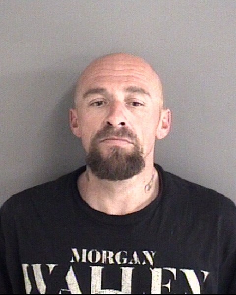 Mugshot of JUSTIN ALBERT HOPKINS