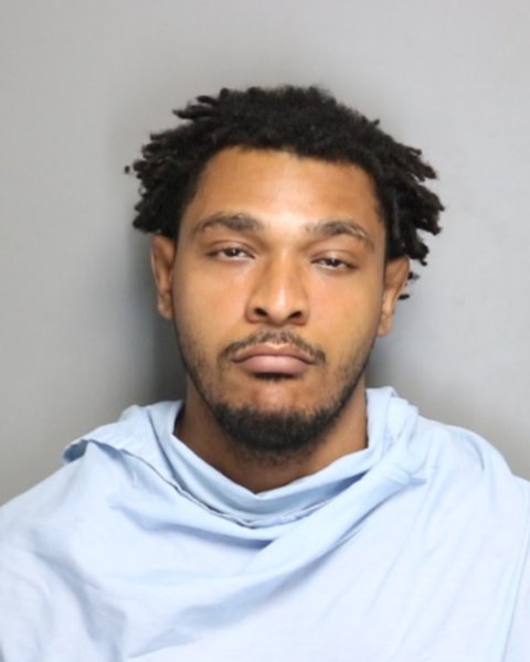 Mugshot of ERICK ORLANDO, Junior JOHNSON