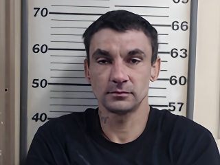 Mugshot of SIMMONS CHRISTIAN M