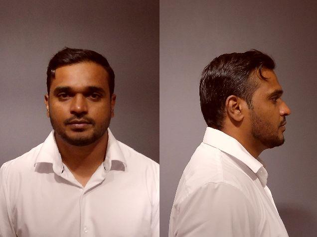 Mugshot of TAUFFEQ MOHAMMED