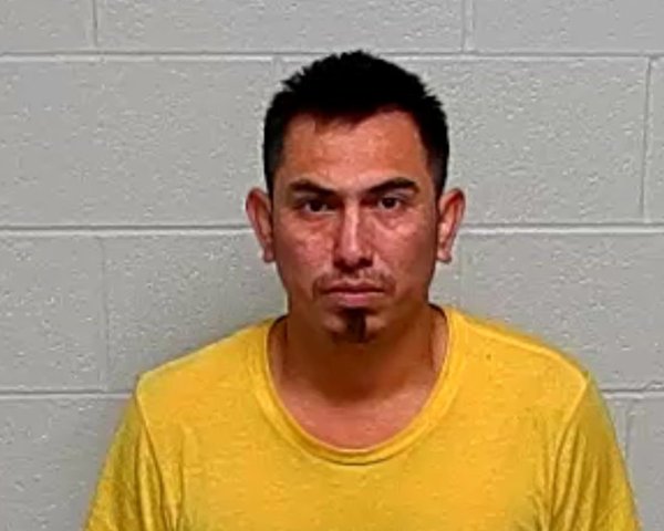 Mugshot of MIGUEL A DOMINGUEZ