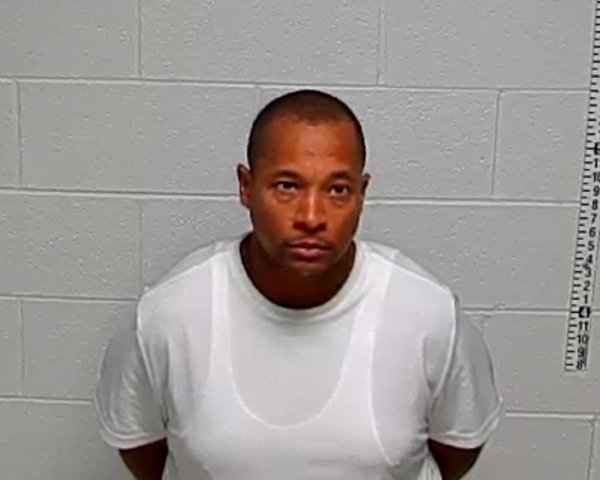 Mugshot of JUSTIN C MOLAND