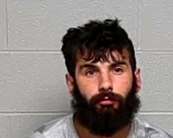 Mugshot of JUSTIN T MOLINA