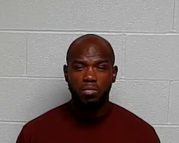 Mugshot of TRAVIS M HINTON
