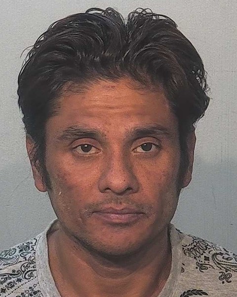 Mugshot of Hu Sin