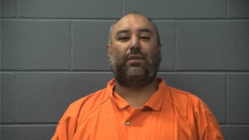 Mugshot of REYNALDO MARTINEZ