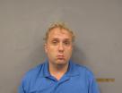 Mugshot of TYLER RAY MANBECK