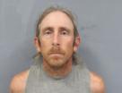 Mugshot of MATTHEW L RHYNE