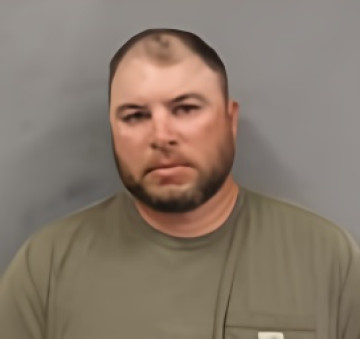 Mugshot of ETHAN W SUMMERS