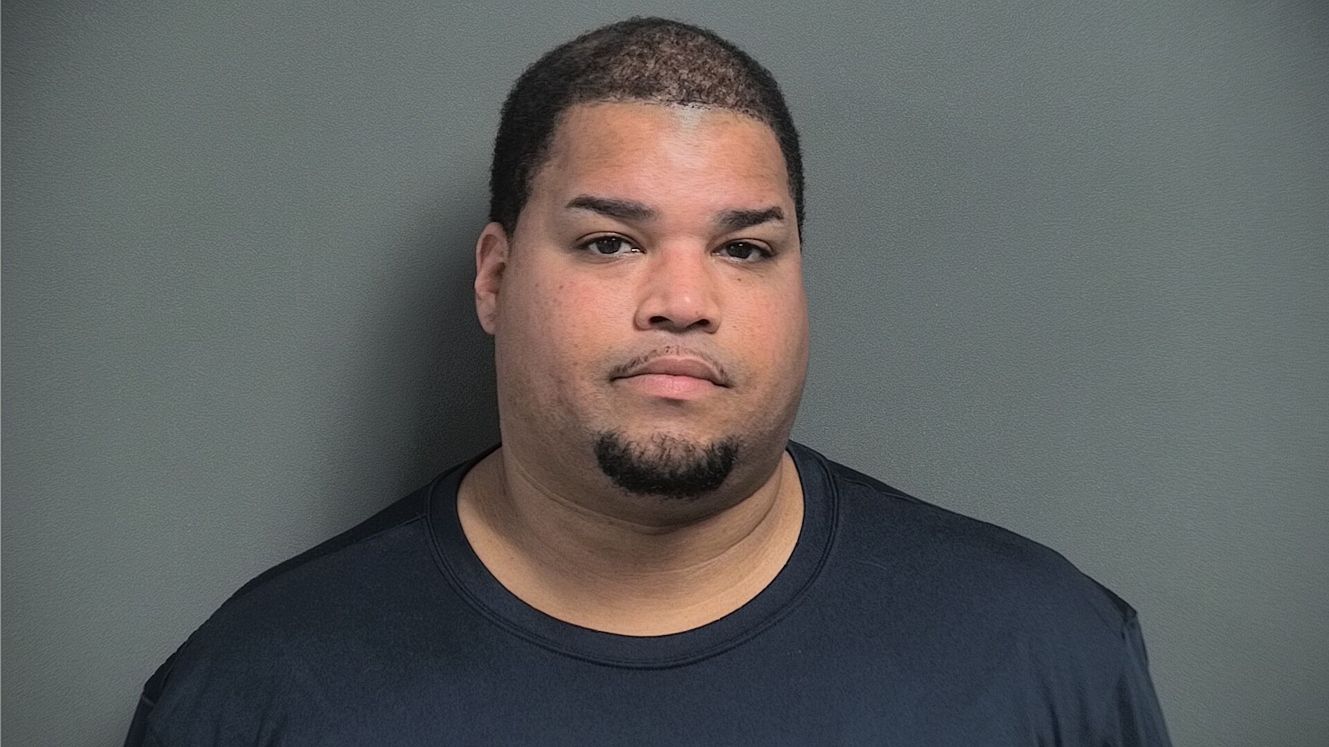 Mugshot of JOHNNIE B JR. HOGAN