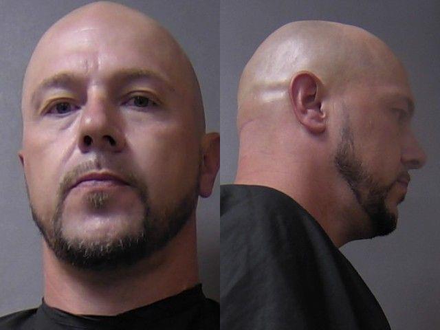 Mugshot of Aaron Randall Rhoades