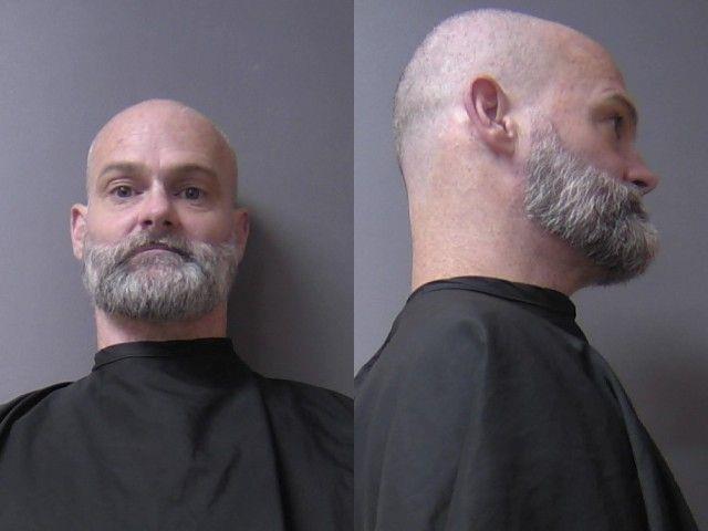 Mugshot of Richard M Woods