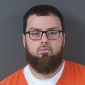 Mugshot of Aron J. Monnett