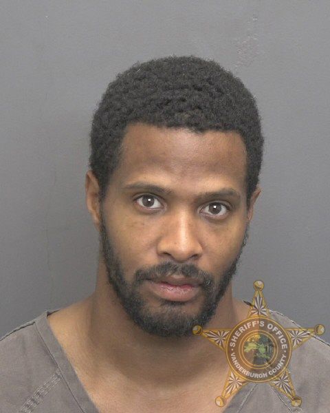 Mugshot of TARON RAPHAEL MOMON