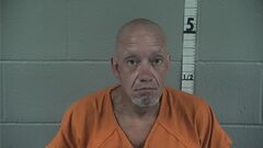 Mugshot of Raymond Collins