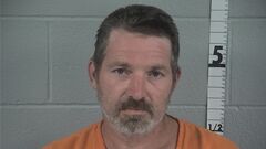 Mugshot of JONATHAN BRENNAN