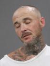 Mugshot of JUSTIN ALLEN RETTINGER