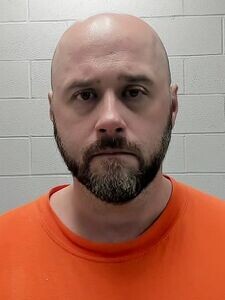 Mugshot of JUSTIN METZ