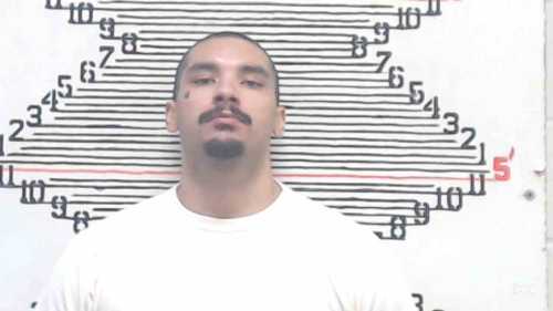 Mugshot of Manuel Ray Flores