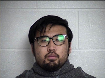 Mugshot of YONGJIAN XU