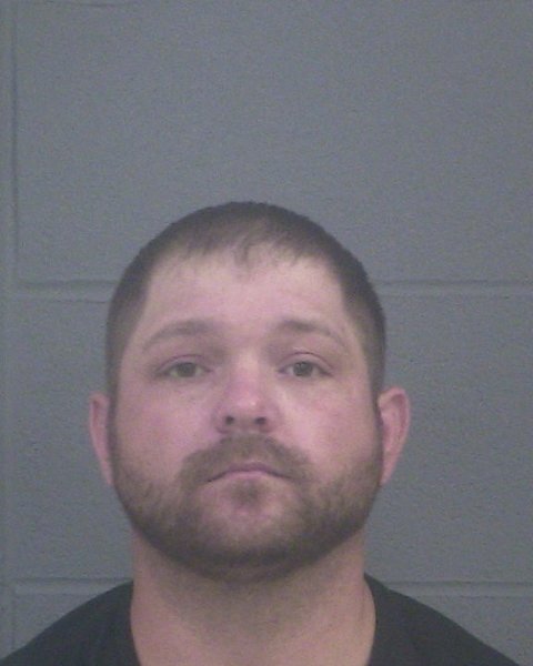 Mugshot of TRAVIS HOLLOWAY
