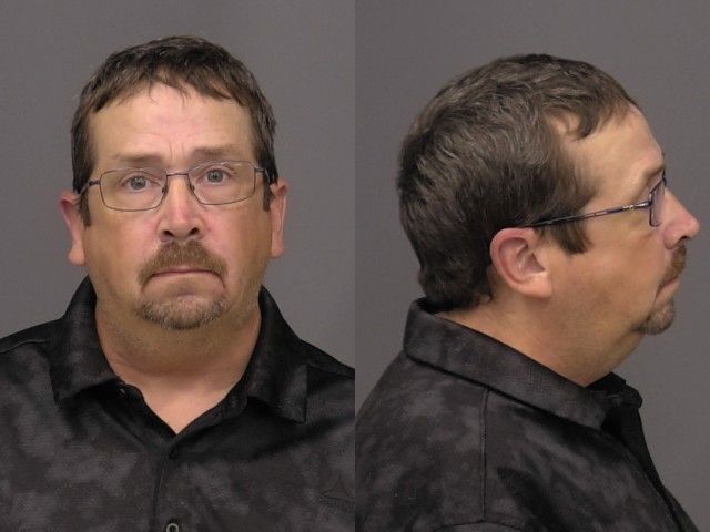 Mugshot of Mitchel Earl Kado