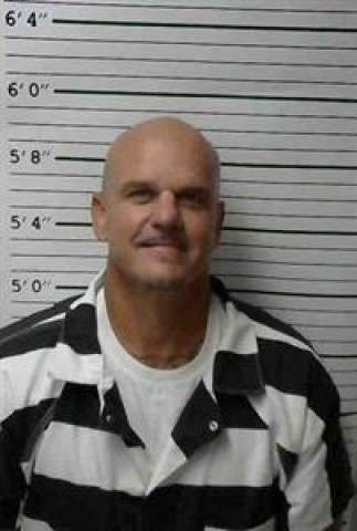 Mugshot of JOHN COLBY MANUEL