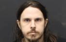 Mugshot of JUSTIN GERARD BUECHE