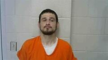Mugshot of JUSTIN L COMEAUX