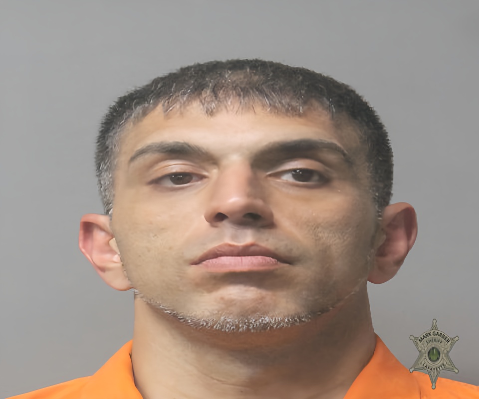 Mugshot of POURIYE JOHN IGHANI