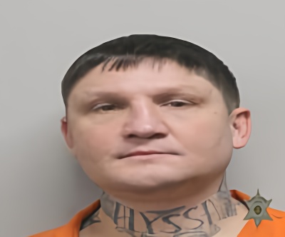 Mugshot of JUSTIN BURCH PLOUET