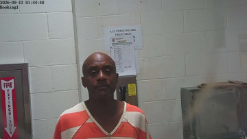 Mugshot of CARLOS DEWAN STRINGFELLOW