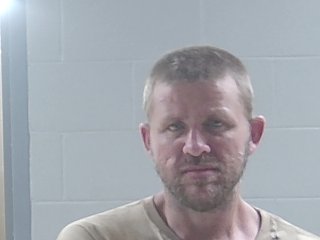 Mugshot of DYLAN L KYZAR