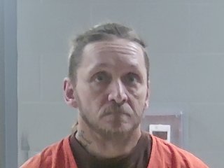 Mugshot of DONOVAN JOHN DRONET