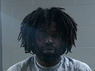 Mugshot of PYSAN MOTON